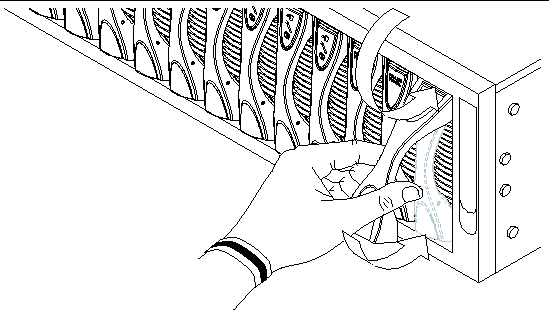 Illustration shows a hand closing the lever mechanism of a securely installed blade
