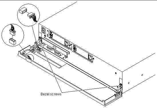This figure shows the location of the bezel cables and the bezel screws that belong to the bezel assembly.