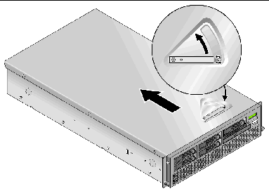 Graphic showing the location of the V40z cover latch release and direction to slide the cover off.